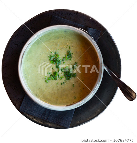Vegetable puree served in a soup plate Vegetable puree served in a soup plate 107684775