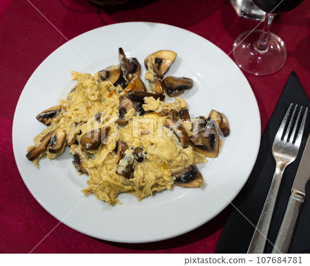 mushroom with eggs mushroom with eggs 107684781