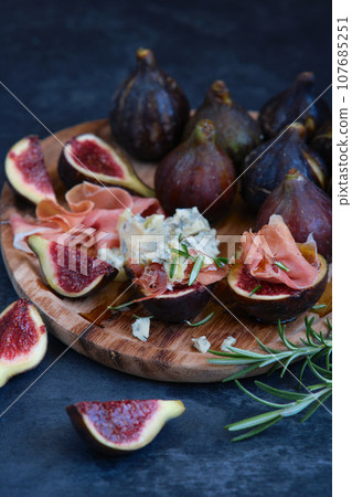 figs cheese with mold and jamon figs cheese with mold and jamon 107685251