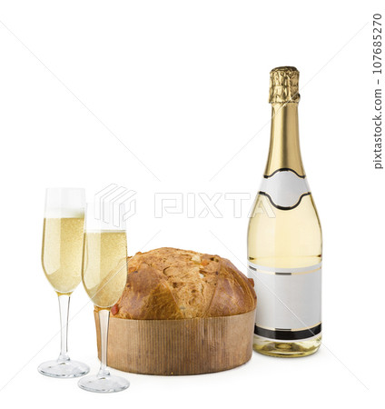 Champagne bottle with glasses and panettone. Champagne bottle with glasses and panettone. 107685270