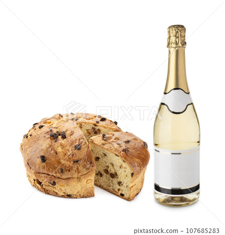 Champagne bottle with panettone. Christmas dessert. Champagne bottle with panettone. Christmas dessert. 107685283