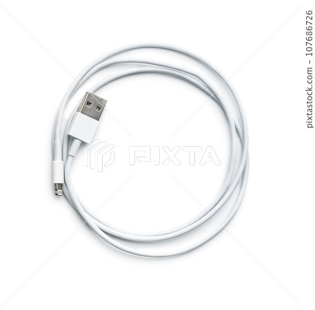 White usb charging cables isolated on white background. White usb charging cables isolated on white background. 107686726