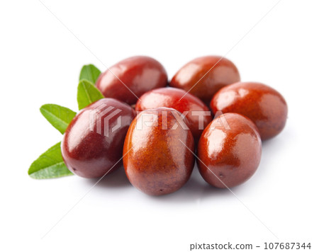 Dates fruits on white backgrounds 107687344