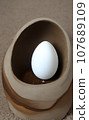 eggs in a wooden bowl 107689109