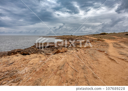 Natural beach near city Can Picafort. Balearic Islands Mallorca Spain. 107689228
