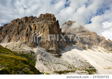 Rugged rocky peaks of Paterno mountain in Sexten Dolomite range Rugged rocky peaks of Paterno mountain in Sexten Dolomite range 107689785