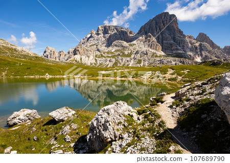 Natural lakes Bodenseen surrounded by rocky mountains in Sexten Dolomites 107689790