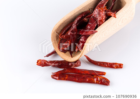 dried chili on white background dried chili on white background 107690936