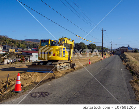 Road construction_Scenery of foundation work and heavy machinery Road construction_Scenery of foundation work and heavy machinery 107691200