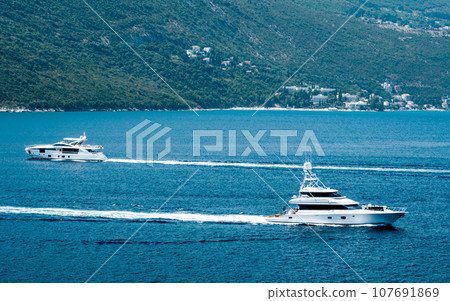 Boat in Adriatic sea, Montenegro Boat in Adriatic sea, Montenegro 107691869