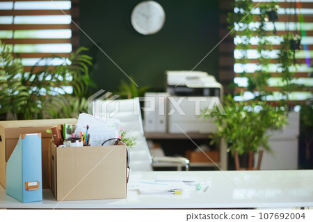 desk in modern green office desk in modern green office 107692004
