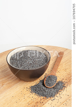Poppy Seed, Blue Poppyseed Pile, Small Culinary Grains, Tiny Seeds, Oilseed Sprinkles Poppy Seed, Blue Poppyseed Pile, Small Culinary Grains, Tiny Seeds, Oilseed Sprinkles 107694705