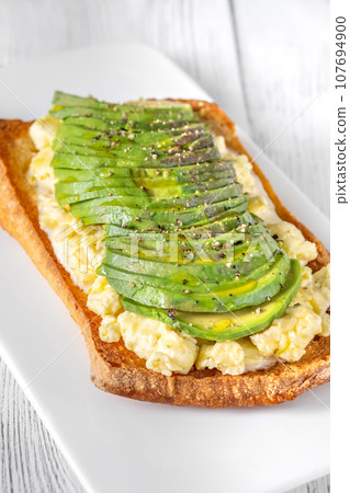 Scrambled eggs avocado sandwich Scrambled eggs avocado sandwich 107694900