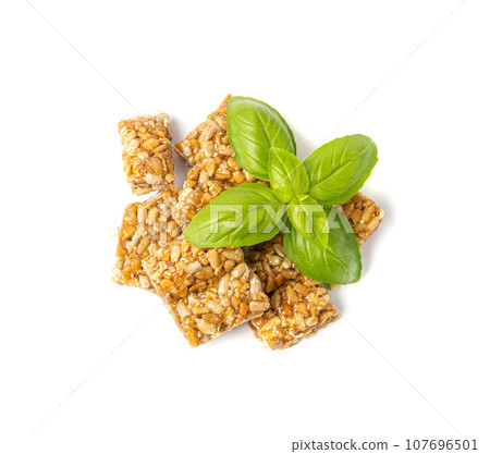 Sunflower Seeds Bar Isolated, Energy Snack with Honey, Sun Flower Seed Muesli Dessert, Protein Candy Bar Sunflower Seeds Bar Isolated, Energy Snack with Honey, Sun Flower Seed Muesli Dessert, Protein Candy Bar 107696501
