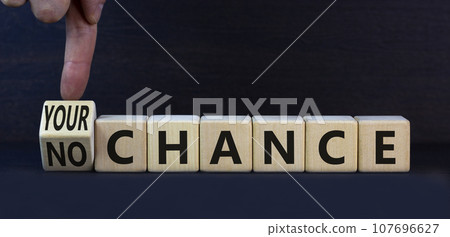 No or your chance symbol. Turned wooden cubes and changed concept words No chance to Your chance. Beautiful grey table grey background, copy space. Business and no or your chance concept. No or your chance symbol. Turned wooden cubes and changed concept words No chance to Your chance. Beautiful grey table grey background, copy space. Business and no or your chance concept. 107696627