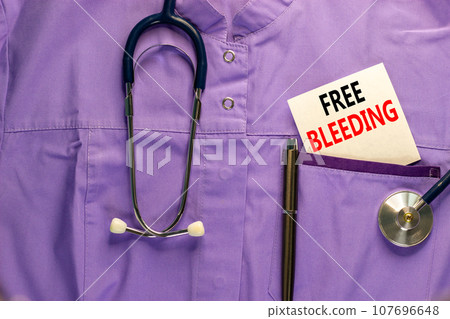 Free bleeding symbol. Concept words Free bleeding on beautiful white card. Beautiful purple background. Stethoscope on medical uniform. Gen Z motivational freedom free bleeding concept. Copy space. Free bleeding symbol. Concept words Free bleeding on beautiful white card. Beautiful purple background. Stethoscope on medical uniform. Gen Z motivational freedom free bleeding concept. Copy space. 107696648