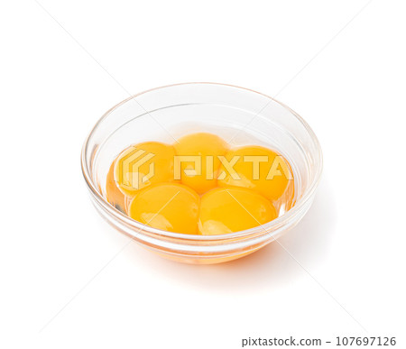 Egg Yolks in Bowl, Fresh Chicken Egg Yolk Separated from Whites for Cooking Recipe, Organic Yolks Top View Egg Yolks in Bowl, Fresh Chicken Egg Yolk Separated from Whites for Cooking Recipe, Organic Yolks Top View 107697126