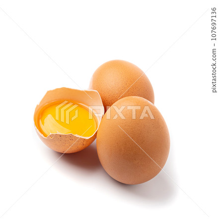 Broken Egg Isolated, Raw Yolk and White, Cracked Brown Shell, Fresh Broken Chicken Eggs on White Background 107697136