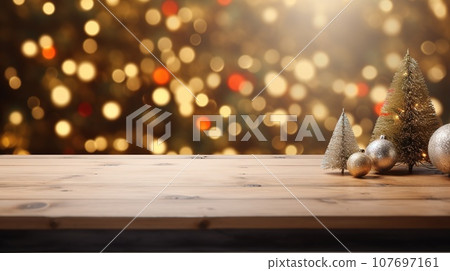Empty wooden table with Christmas tree in background, perfect for showcasing your products or designs. 107697161