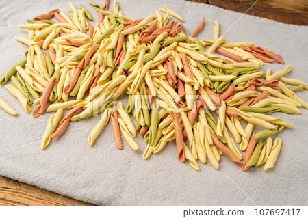 Raw Trofie Pasta, Dry Italian Macaroni, Traditional Genoa Food, Raw Noodle, Modern Ligurian Cuisine 107697417