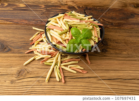 Raw Trofie Pasta, Dry Italian Macaroni, Traditional Genoa Food, Raw Noodle, Modern Ligurian Cuisine 107697431