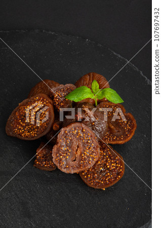 Dry Fig, Dried Ficus Carica Fruit, Sweet Healthy Diet, Tropical Dessert, Wrinkled Dehydrated Snack Dry Fig, Dried Ficus Carica Fruit, Sweet Healthy Diet, Tropical Dessert, Wrinkled Dehydrated Snack 107697432