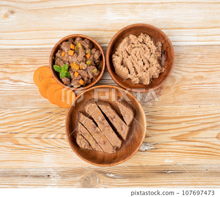 Pet Food, Wet Food for Cats, Dog Canned Pate, Soft Pet Food on White 107697473