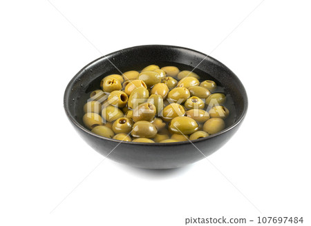 Green Pickled Olives Isolated, Olive Pickles, Pitted Fermented Olives Green Pickled Olives Isolated, Olive Pickles, Pitted Fermented Olives 107697484
