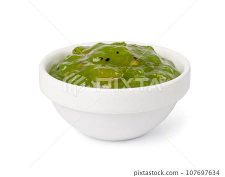 Green Jam Isolated, Sweet Kiwi Confiture in Bowl, Gooseberry Marmalade, Green Tomato Jam Green Jam Isolated, Sweet Kiwi Confiture in Bowl, Gooseberry Marmalade, Green Tomato Jam 107697634