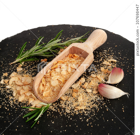 Dry Garlic Slices, Crispy Fried Cloves Pile Closeup, Roasted Grilled Garlic Flakes, Clove Chip Group Dry Garlic Slices, Crispy Fried Cloves Pile Closeup, Roasted Grilled Garlic Flakes, Clove Chip Group 107698447