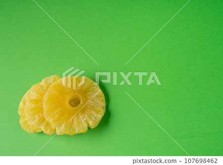 Dry Pineapple Rings Isolated, Candy Pineapples, Dehydrated Yellow Sugar Fruit, Candied Fruits Circles 107698462