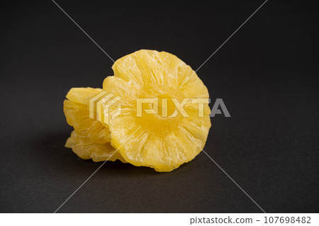 Dry Pineapple Rings Isolated, Candy Pineapples, Dehydrated Yellow Sugar Fruit, Candied Fruits Circles 107698482