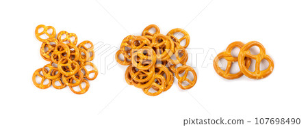 Pretzel Cookies Stack Isolated, Small Salted Pretzels, Crispy German Brezel Snack 107698490