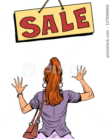 Promotions for store customers. Expectation from the upcoming black friday. A girl with red hair looks at the sign "SALE" 107698668
