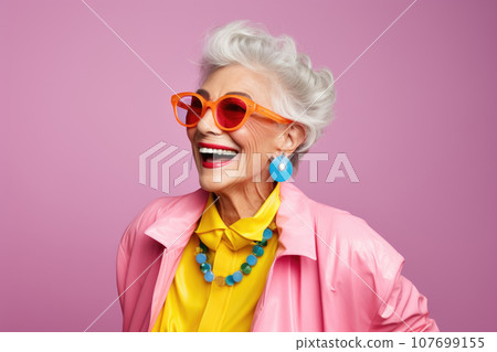 Beautiful stylish elderly woman with grey hair in elegant clothes and glasses Beautiful stylish elderly woman with grey hair in elegant clothes and glasses 107699155