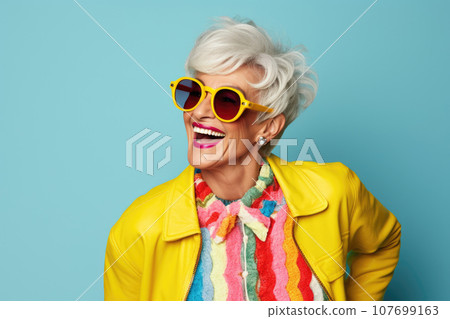 Beautiful stylish elderly woman with grey hair in elegant clothes Beautiful stylish elderly woman with grey hair in elegant clothes 107699163