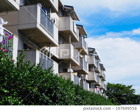 Balcony on the south side of the apartment complex Balcony on the south side of the apartment complex 107699558