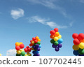 Rainbow colored balloons multiple 107702445