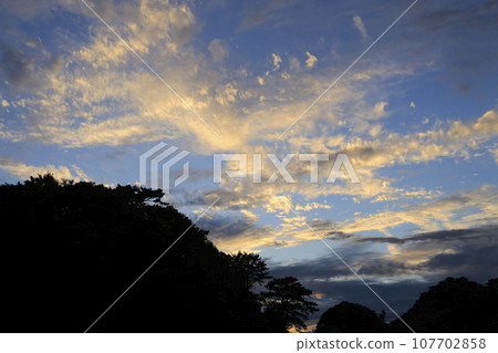 The fishing port bathed in the sunset at Nishina Port The fishing port bathed in the sunset at Nishina Port 107702858
