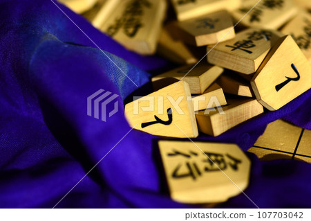 shogi pieces on the shogi board shogi pieces on the shogi board 107703042