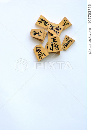 Shogi pieces with white background Shogi pieces with white background 107703736