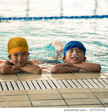 Kids swimming Kids swimming 107703783