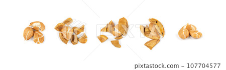 Dry Apricot Kernels Isolated on White Background Dry Apricot Kernels Isolated on White Background 107704577