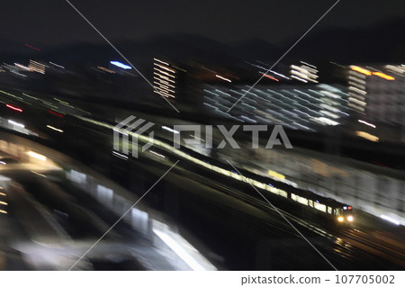 JR Kobe Line 223 series (new rapid train) passing near Himeji Station late at night JR Kobe Line 223 series (new rapid train) passing near Himeji Station late at night 107705002