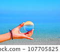 Tropical sea and crystal ball 107705825