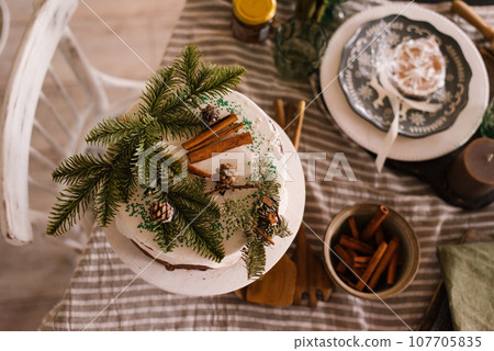 Beautiful table setting for Christmas dinner 107705835