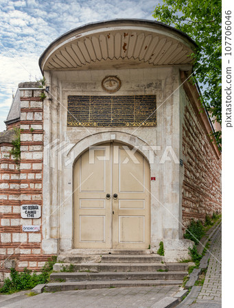 Entrance of Ottoman baroque style Haci Besir Aga Mosque, located in Fatih district of Istanbul, Turkey, built in 1719 107706046