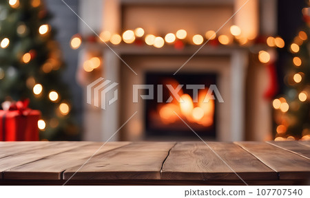 Christmas table with blurred fireplace backdrop 107707540