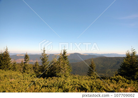 Mount Hoverla hanging peak of the Ukrainian Carpathians against the background of the sky Mount Hoverla hanging peak of the Ukrainian Carpathians against the background of the sky 107709002