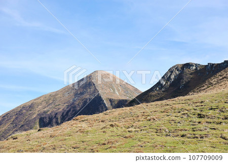 Mount Hoverla hanging peak of the Ukrainian Carpathians against the background of the sky 107709009